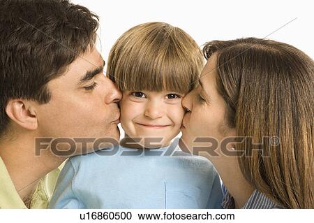 Mother and father kissing son on opposite cheeks View Large Photo Image Stock Image - Mother and father kissing son on opposite cheeks. Fotosearch