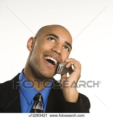 Head and shoulder portrait of African American man in suit talking on cellphone. View Large Photo Image Stock Image - Head and shoulder portrait of African American man in suit talking on cellphone.. Fotosearch