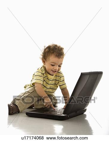 Toddler boy on laptop computer. View Large Photo Image Stock Photo - Toddler boy on laptop computer.. Fotosearch