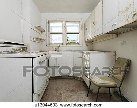 Empty abandoned dirty kitchen View Large Photo Image Stock Image - Empty abandoned dirty kitchen. Fotosearch