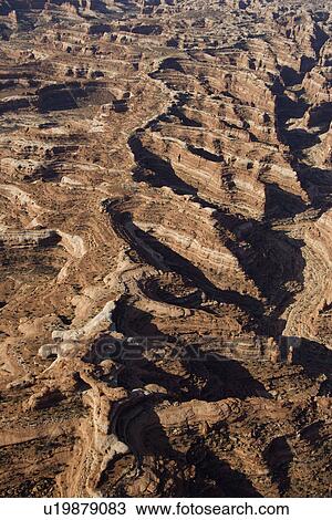 Aerial of desert canyon in Canyonlands National Park in Utah, USA View Large Photo Image Stock Image - Aerial of desert canyon in Canyonlands National Park in Utah, USA. Fotosearch
