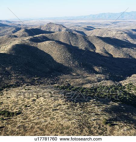 Stock Image - Aerial view of Arizona landscape with mountain range. Fotosearch