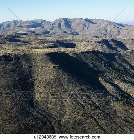 Stock Photography - Aerial view of Arizona landscape with mountain range.. Fotosearch