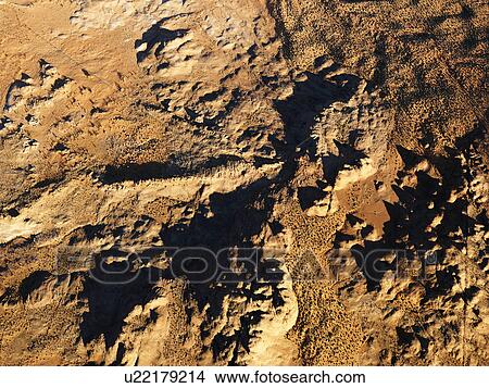 Aerial view of barren arid desert landscape View Large Photo Image Picture - Aerial view of barren arid desert landscape. Fotosearch