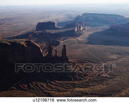 Stock Photo - Aerial view of desert landscape in Monument Valley, Utah.. Fotosearch