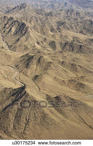 Aerial view of desert mountains. View Large Photo Image Picture - Aerial view of desert mountains.. Fotosearch