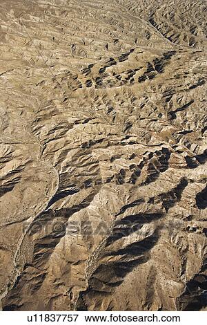 Aerial view of mountainous terrain in southwest View Large Photo Image Stock Photo - Aerial view of mountainous terrain in southwest. Fotosearch