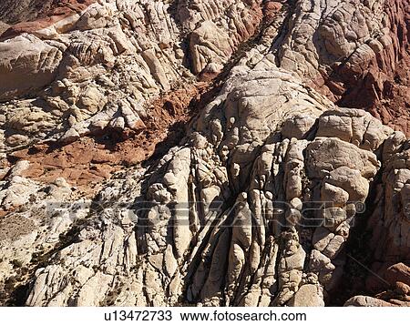 Stock Image - Aerial view of red rock cliffs in southwest.. Fotosearch