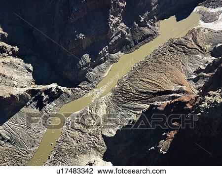 Stock Image - Aerial view of river valley in Utah Canyonlands. Fotosearch