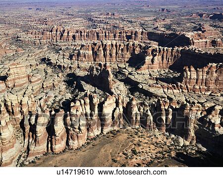 Stock Image - Aerial view of rock formations in Utah Canyonlands. Fotosearch