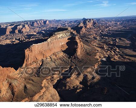 Aerial view of southwest desert with cliffs and rock formations. View Large Photo Image Picture - Aerial view of southwest desert with cliffs and rock formations.. Fotosearch