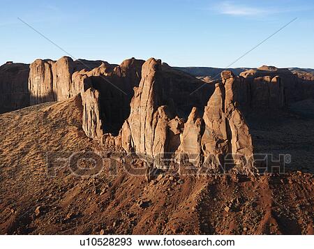 Desert landscape with buttes in Monument Valley. View Large Photo Image Stock Image - Desert landscape with buttes in Monument Valley.. Fotosearch
