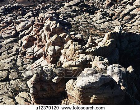 Stock Image - Rugged rock formations in Utah Canyonlands. Fotosearch