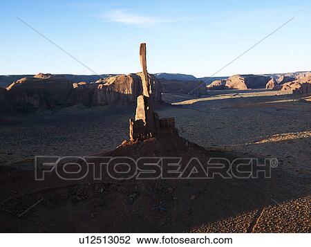 Stock Image - Totem Pole sandstone rock formation in Monument Valley, Utah. Fotosearch