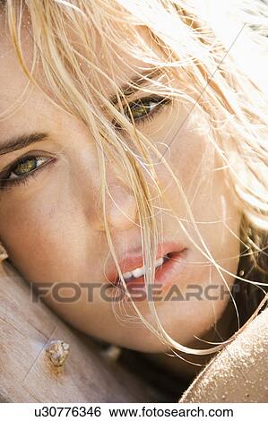 Stock Photograph - Close up of pretty blond woman. Fotosearch