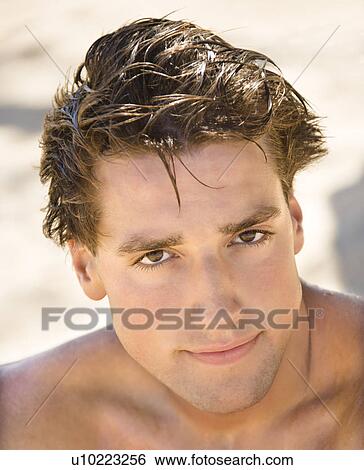 Head and shoulder portrait of handsome man on beach View Large Photo Image Stock Photograph - Head and shoulder portrait of handsome man on beach. Fotosearch