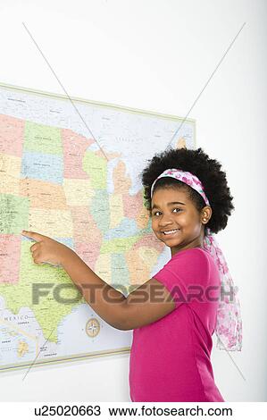 African American girl pointing to map of United States and smiling at viewer. View Large Photo Image Stock Image - African American girl pointing to map of United States and smiling at viewer.. Fotosearch