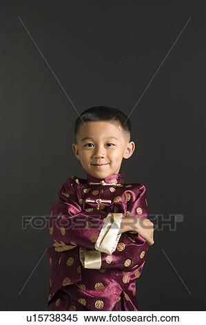 Stock Photography - Boy in traditional attire. Fotosearch