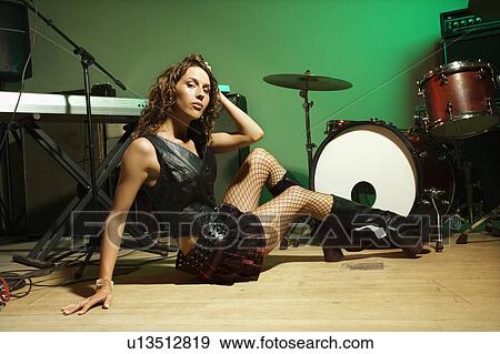 Caucasian female posing with musical equipment. View Large Photo Image Stock Photo - Caucasian female posing with musical equipment.. Fotosearch