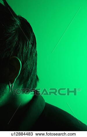 Close up side view portrait of attractive Asian Filipino young adult man tinted green. View Large Photo Image Stock Image - Close up side view portrait of attractive Asian Filipino young adult man tinted green.. Fotosearch