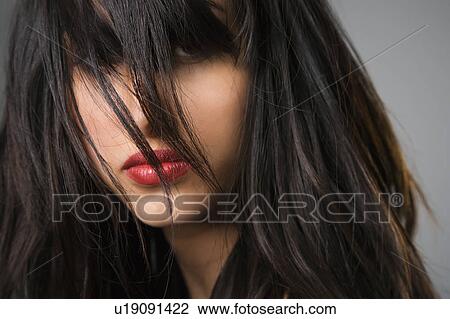 Headshot of pretty young woman with long black hair. View Large Photo Image Stock Image - Headshot of pretty young woman with long black hair.. Fotosearch