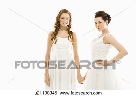 Asian bride holding Caucasian brides hand. View Large Photo Image Stock Photography - Asian bride holding Caucasian brides hand.. Fotosearch