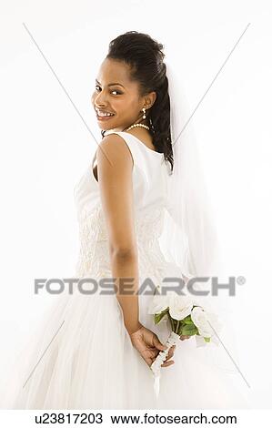 Stock Image - Bride holding bouquet. Fotosearch
