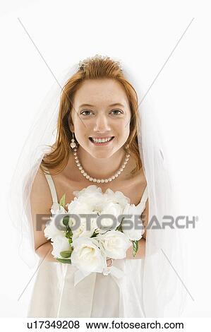 Bride holding bouquet View Large Photo Image Stock Photo - Bride holding bouquet . Fotosearch
