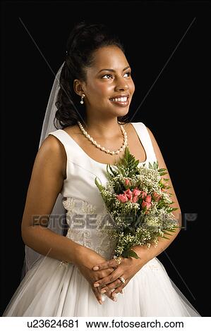 Bride on black background View Large Photo Image Stock Image - Bride on black background. Fotosearch