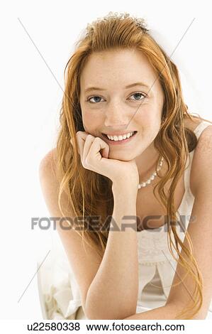 Stock Photo - Bride resting face on her hand . Fotosearch