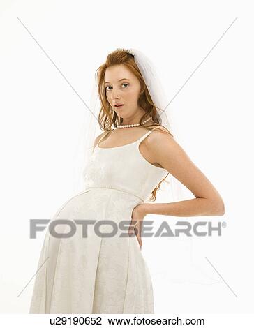 Pregnant Caucasian bride with hands on her back. View Large Photo Image Stock Image - Pregnant Caucasian bride with hands on her back.. Fotosearch