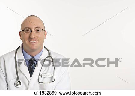 Caucasian mid adult male physician smiling. View Large Photo Image Stock Photo - Caucasian mid adult male physician smiling.. Fotosearch