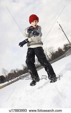 Caucasian boy with mouth open wearing sweater and red winter cap gesturing with arms and hands. View Large Photo Image Stock Image - Caucasian boy with mouth open wearing sweater and red winter cap gesturing with arms and hands.. Fotosearch