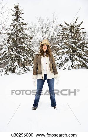 Caucasian young adult female standing in snow wearing straw cowboy hat. View Large Photo Image Stock Image - Caucasian young adult female standing in snow wearing straw cowboy hat.. Fotosearch