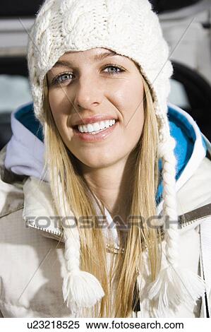 Head and shoulder portrait of attractive young blond woman in winter hat and coat smiling. View Large Photo Image Stock Photography - Head and shoulder portrait of attractive young blond woman in winter hat and coat smiling.. Fotosearch
