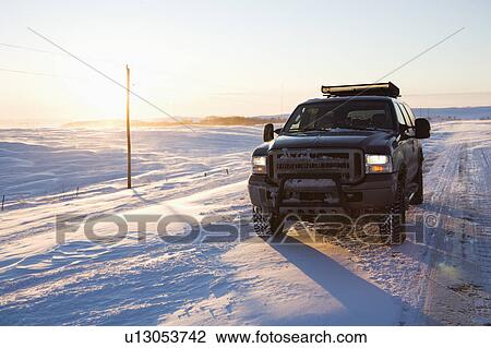 Truck on ice covered road and snowy rural landscape View Large Photo Image Stock Image - Truck on ice covered road and snowy rural landscape. Fotosearch