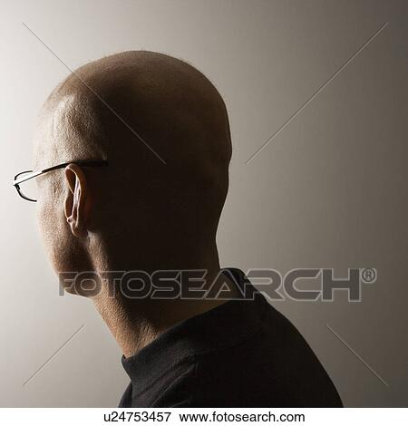 Stock Photo - Back view of mid-adult male's head. Fotosearch