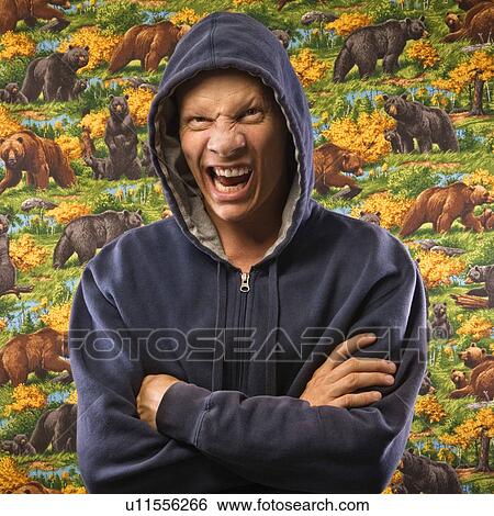 Male wearing a hoodie View Large Photo Image Stock Photograph - Male wearing a hoodie. Fotosearch