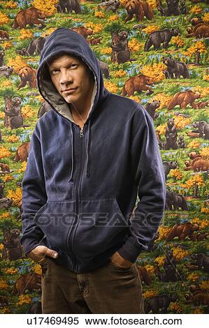 Male wearing a hoodie View Large Photo Image Stock Photography - Male wearing a hoodie. Fotosearch
