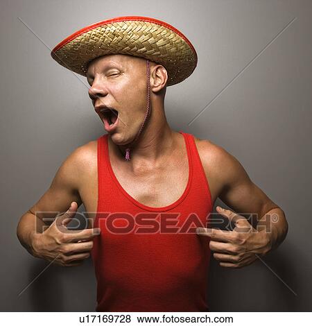 Male wearing straw hat and touching his chest. View Large Photo Image Stock Photo - Male wearing straw hat and touching his chest.. Fotosearch