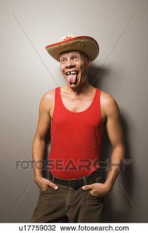 Male wearing straw hat sticking out tongue View Large Photo Image Stock Image - Male wearing straw hat sticking out tongue. Fotosearch