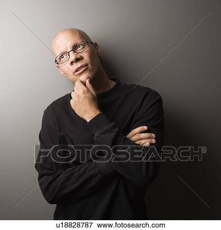 Male with hand on chin View Large Photo Image Stock Photo - Male with hand on chin. Fotosearch