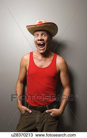 Portrait of a Mid-adult Caucasian male wearing straw hat with expression. View Large Photo Image Stock Image - Portrait of a Mid-adult Caucasian male wearing straw hat with expression.. Fotosearch