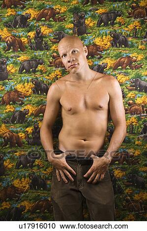Stock Image - Portrait of a shirtless Mid-adult Caucasian male.. Fotosearch
