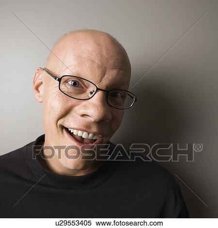 Portrait of mid-adult Caucasian male smiling. View Large Photo Image Stock Photography - Portrait of mid-adult Caucasian male smiling.. Fotosearch