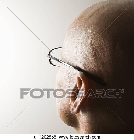 Stock Photo - Rear view of bald man's head. Fotosearch