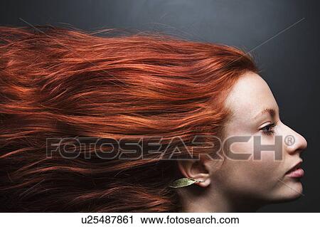 Pretty redhead young woman profile with hair streaming out behind her. View Large Photo Image Stock Image - Pretty redhead young woman profile with hair streaming out behind her.. Fotosearch