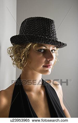 Woman wearing fedora hat View Large Photo Image Stock Photography - Woman wearing fedora hat . Fotosearch