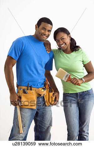 Stock Photo - Couple with home repair tools. Fotosearch