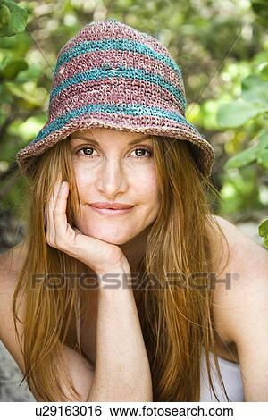 Woman wearing hat View Large Photo Image Stock Photograph - Woman wearing hat. Fotosearch
